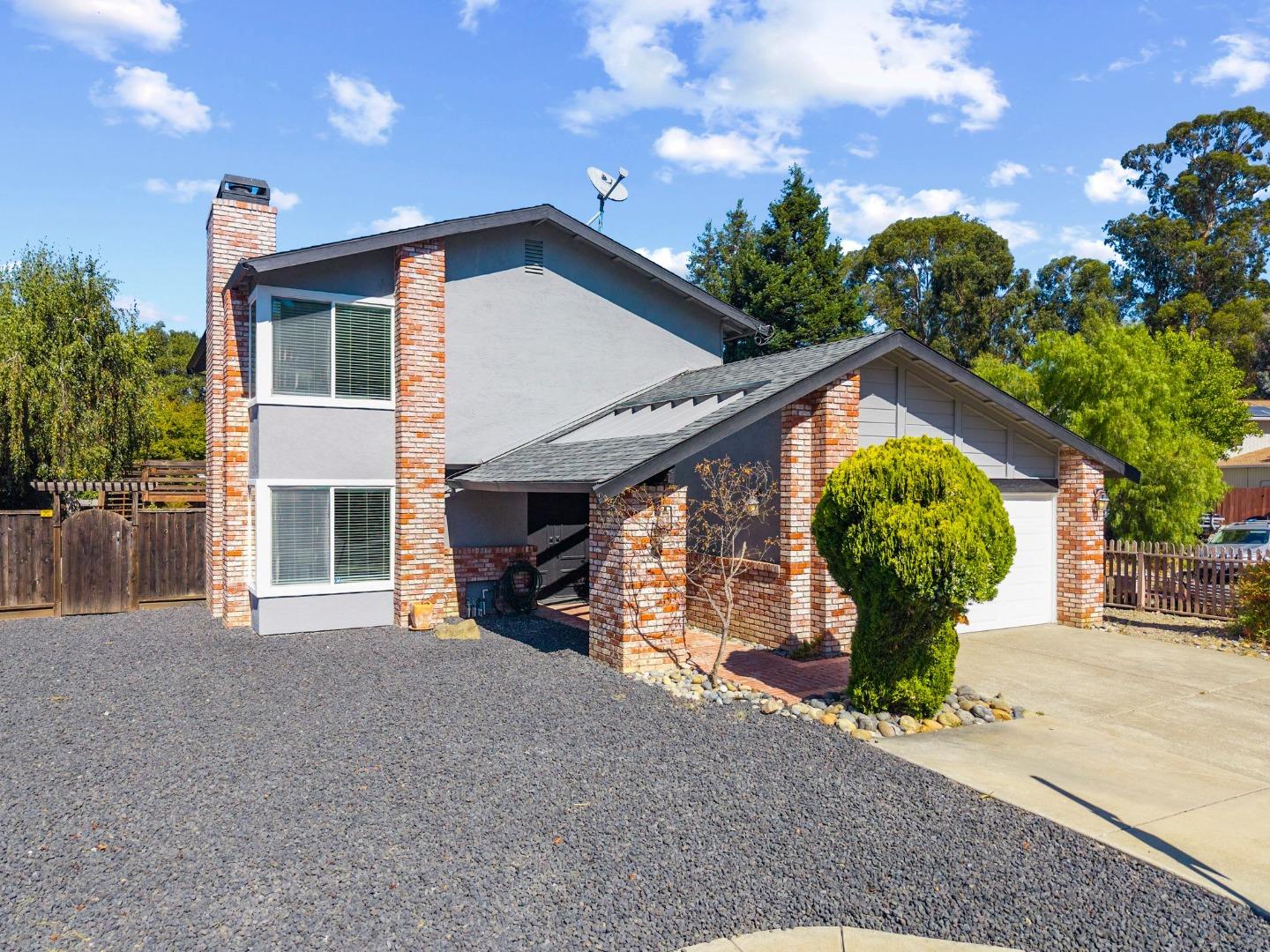 24392 Machado Court Hayward, CA 94541 - Photo 43 of 48 a view of a house with a yard and potted plants