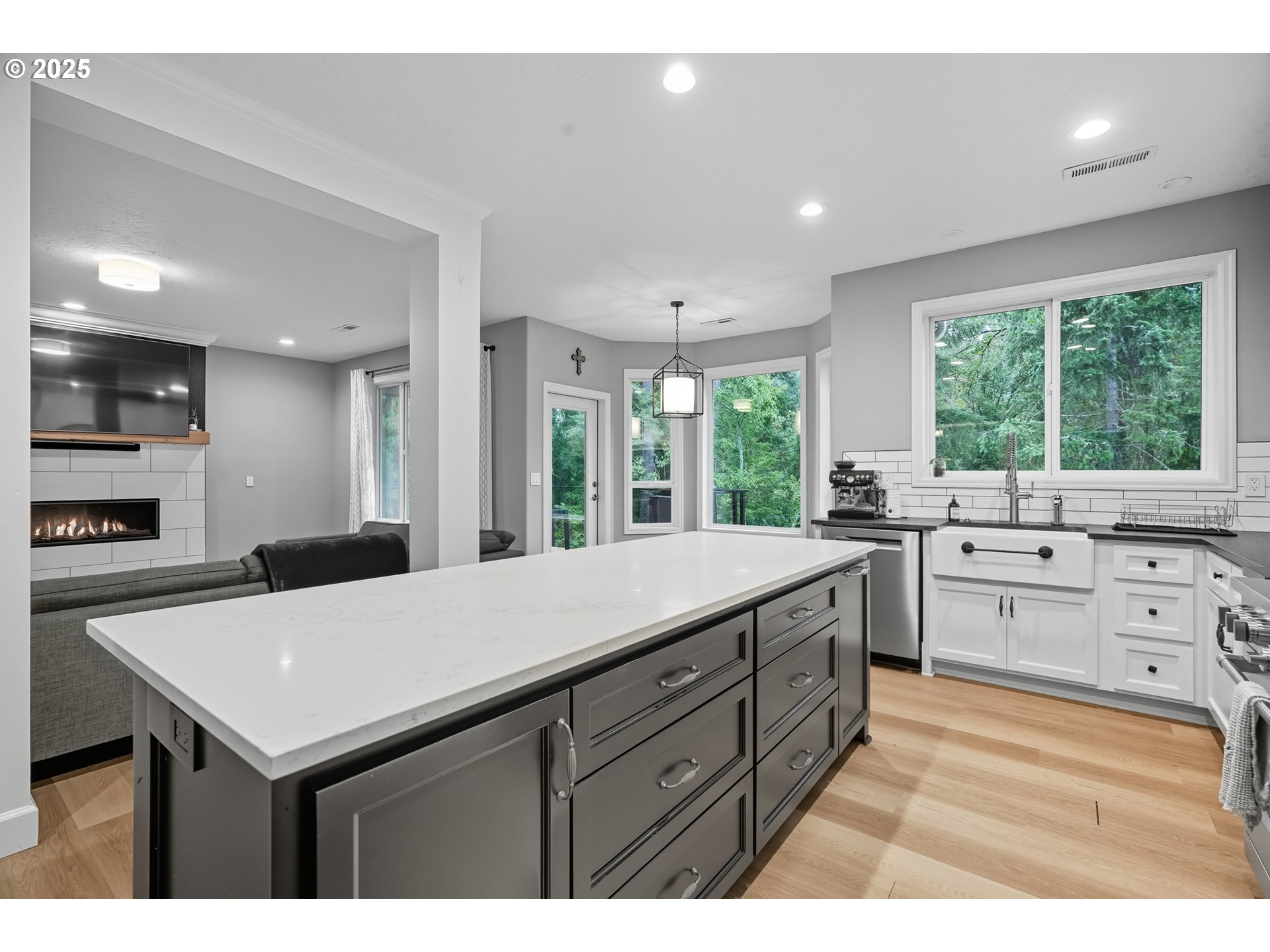 1109 Northwest Frazier Court Portland, OR 97229 - Photo 11 of 44 a kitchen with a stove a sink and a refrigerator