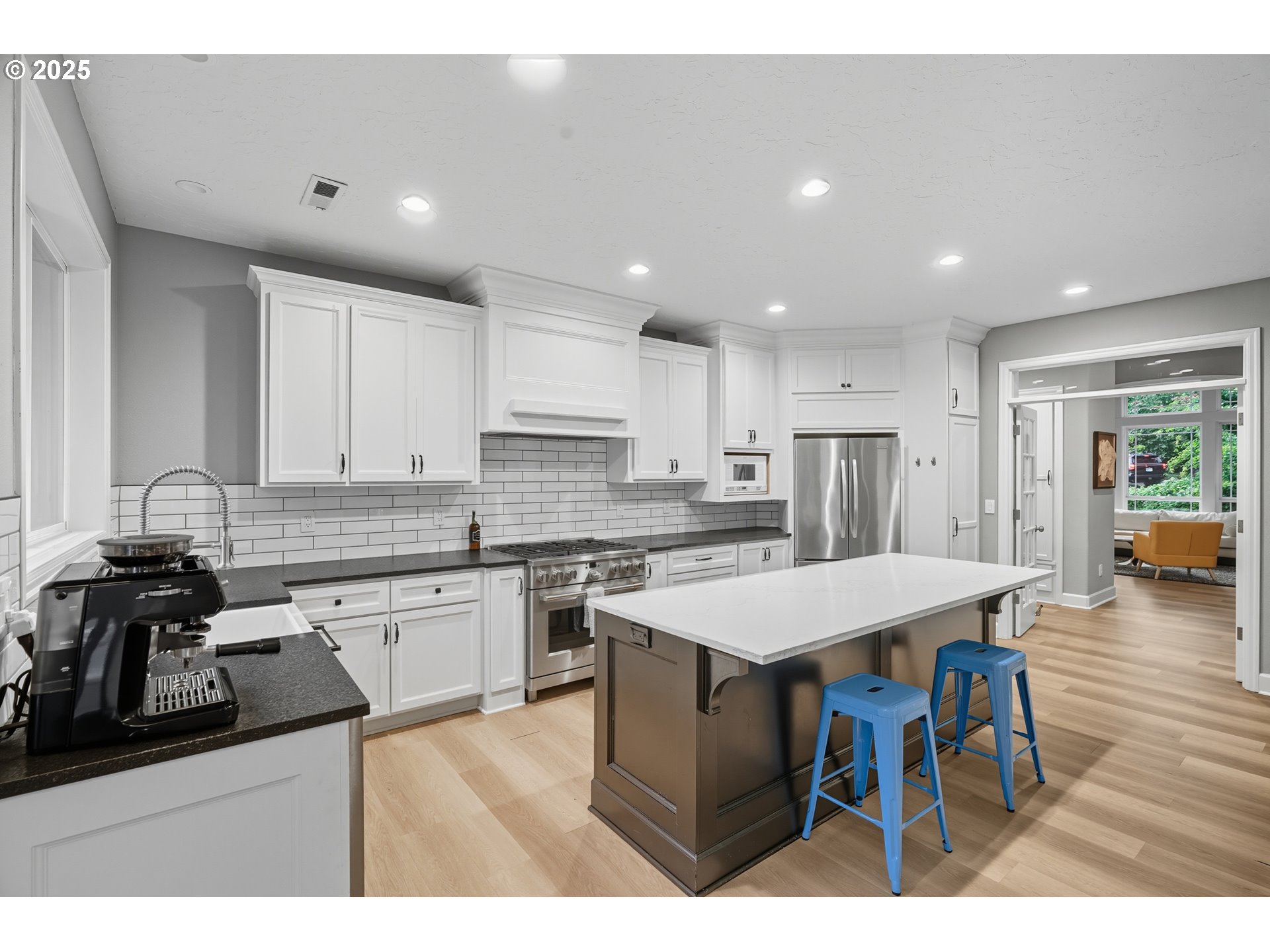 1109 Northwest Frazier Court Portland, OR 97229 - Photo 12 of 44 a kitchen with a sink appliances and cabinets