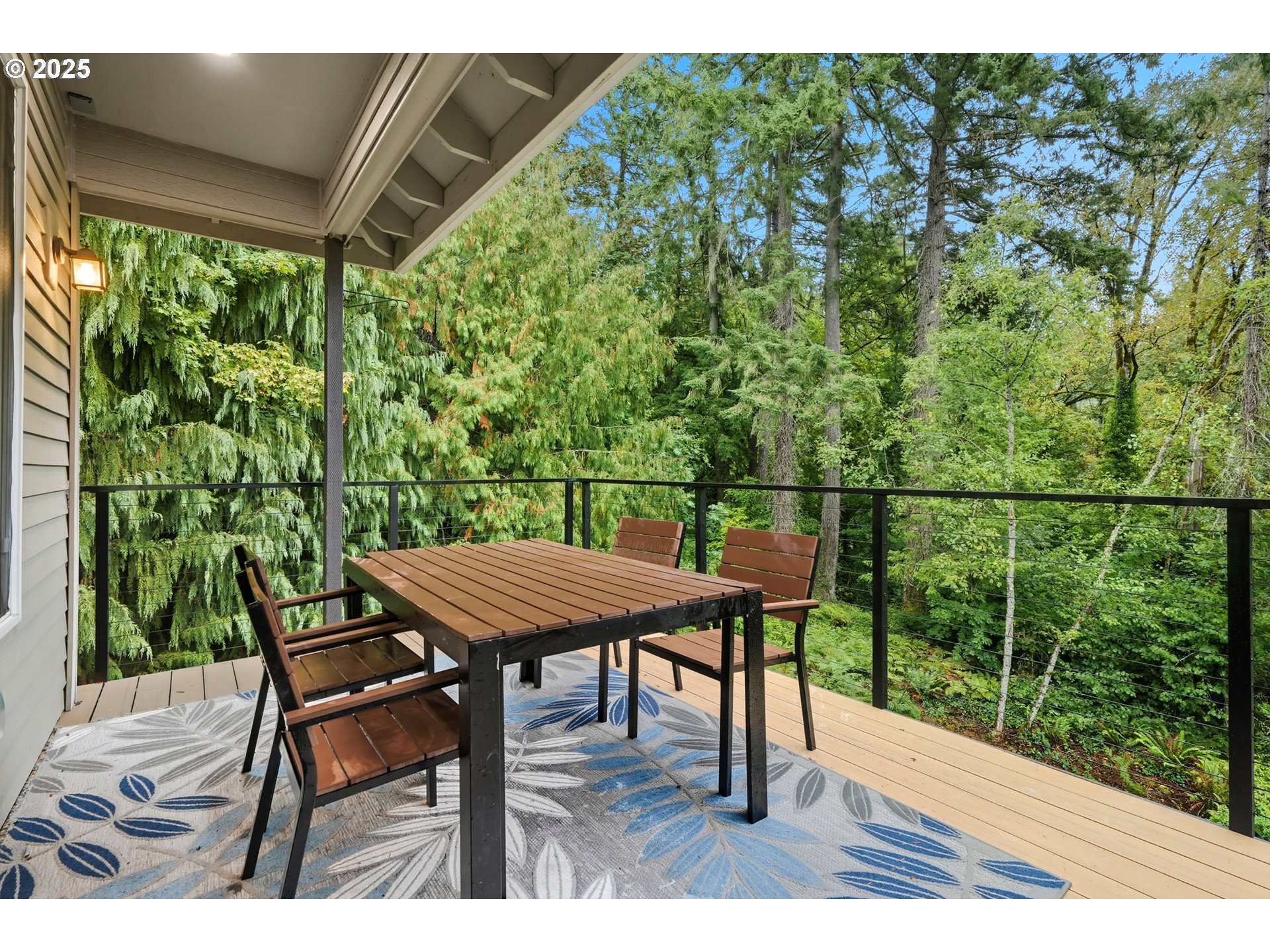 1109 Northwest Frazier Court Portland, OR 97229 - Photo 16 of 44 a view of a chairs and table in the patio