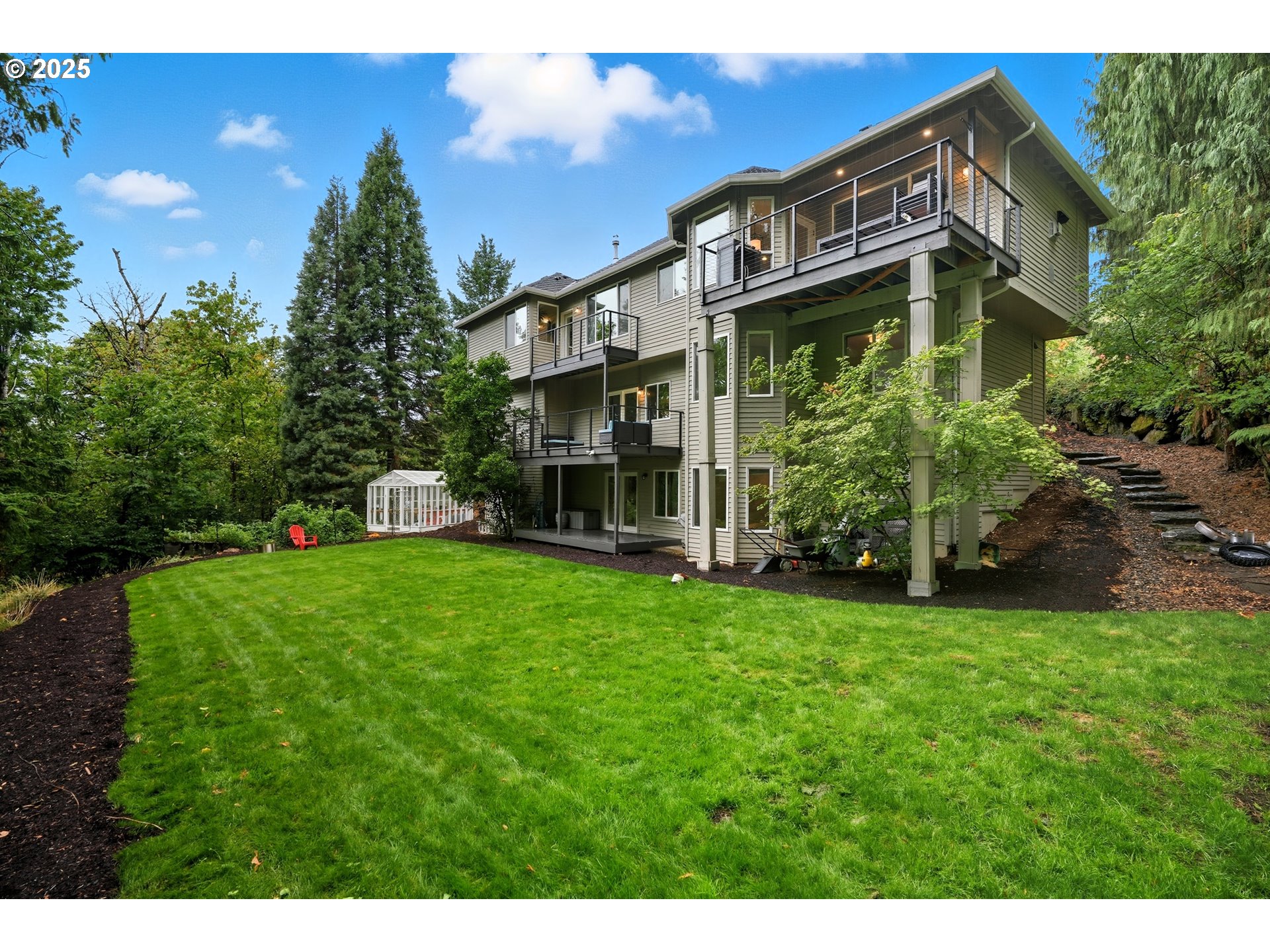 1109 Northwest Frazier Court Portland, OR 97229 - Photo 39 of 44 a front view of a house with garden