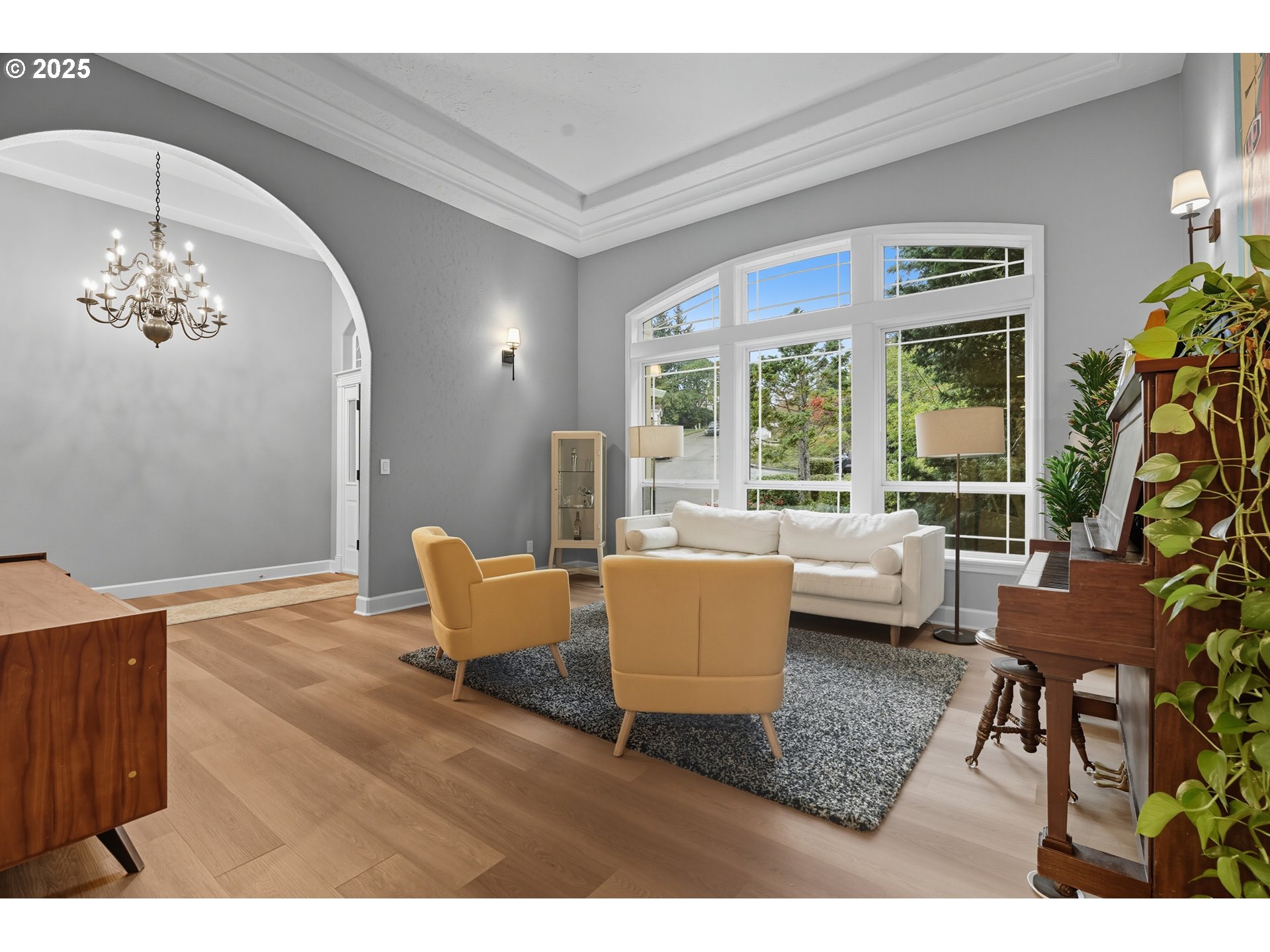 1109 Northwest Frazier Court Portland, OR 97229 - Photo 5 of 44 a living room with furniture and a large window