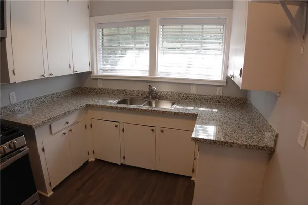 a view of a kitchen sink and dishwasher
