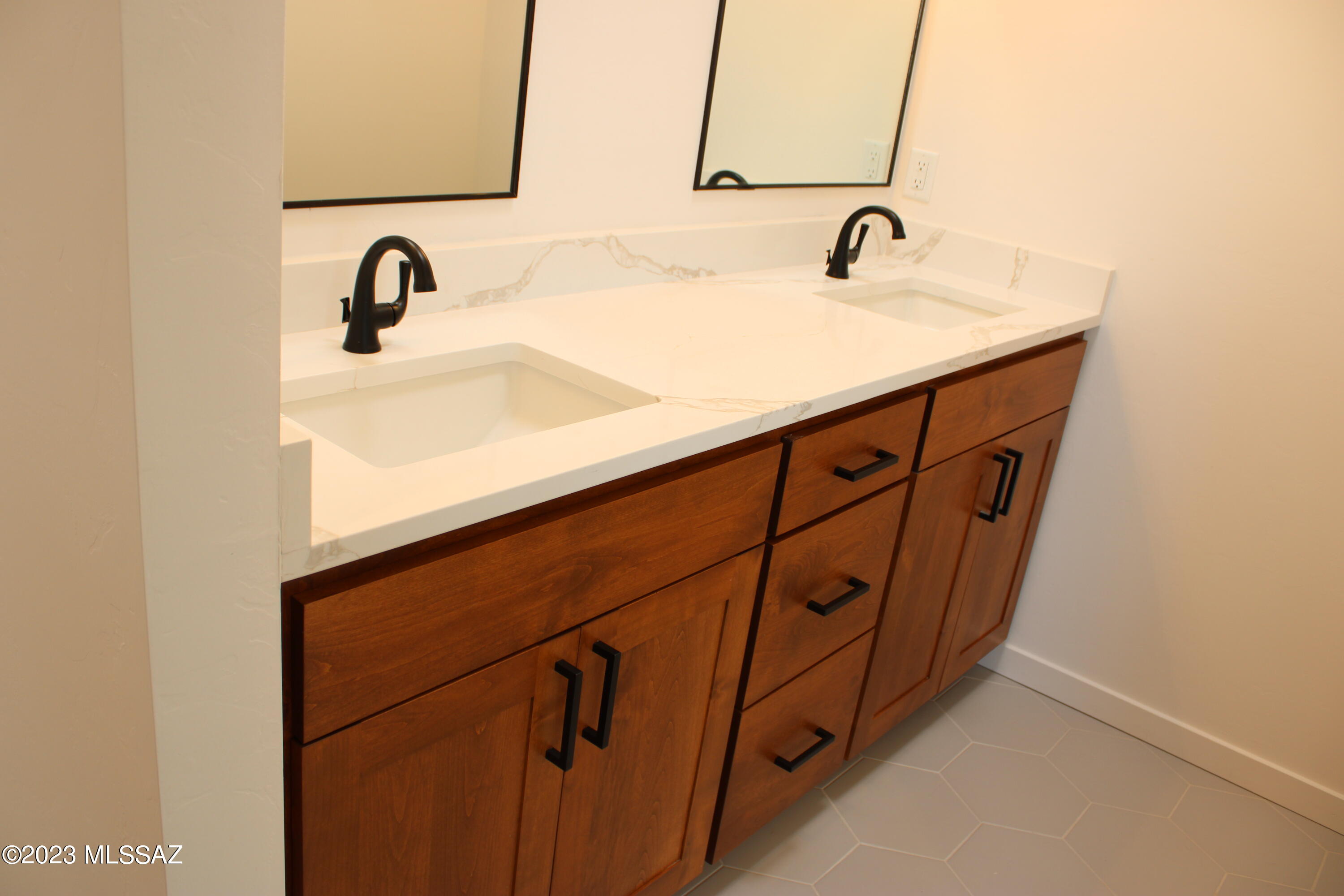 1715 Calle Playa Rio Rico, AZ 85648 - Photo 28 of 37 a bathroom with a sink and mirror