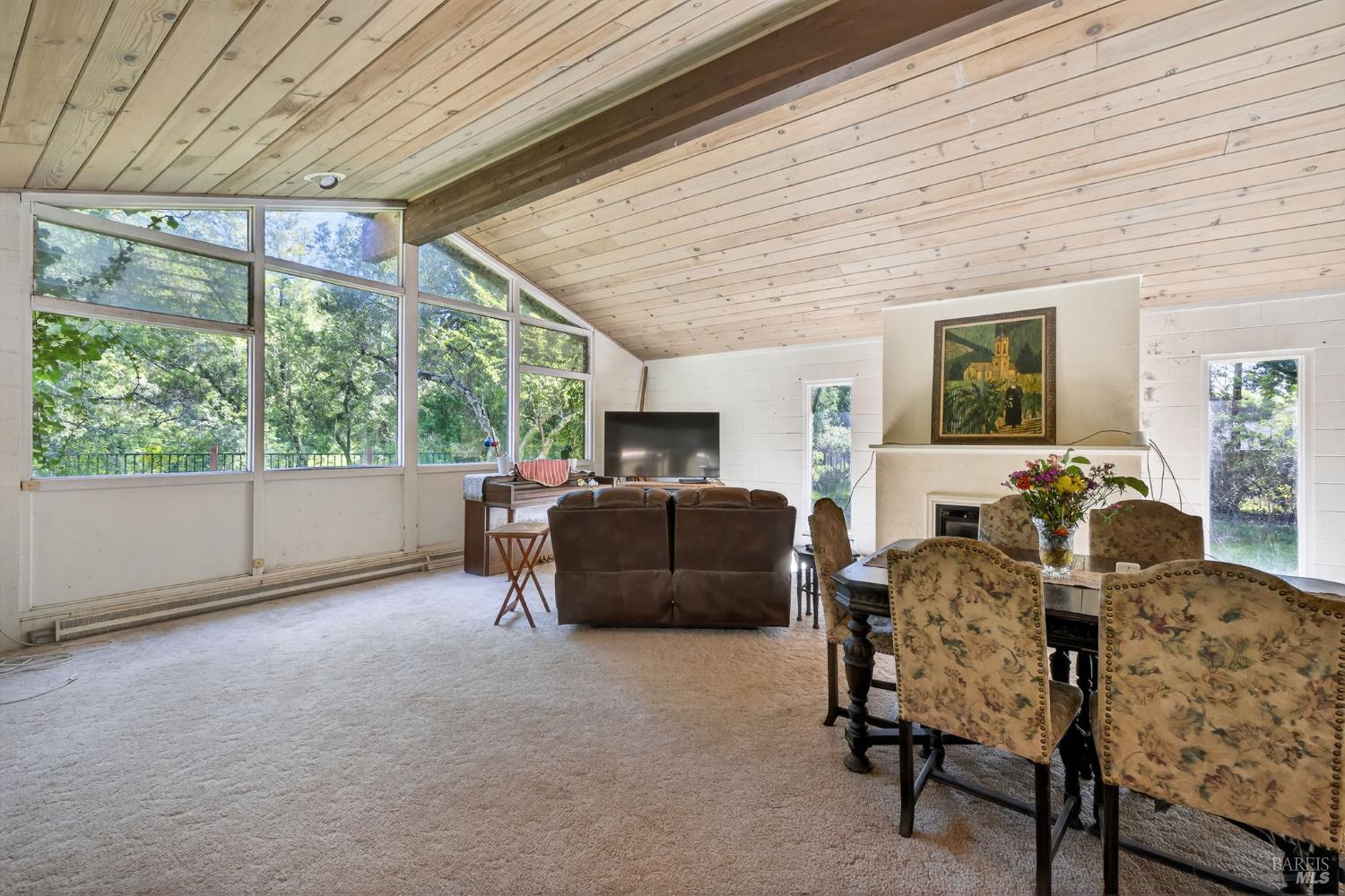 3320 Redwood Road Napa, CA 94558 - Photo 30 of 57 a living room with furniture and a window