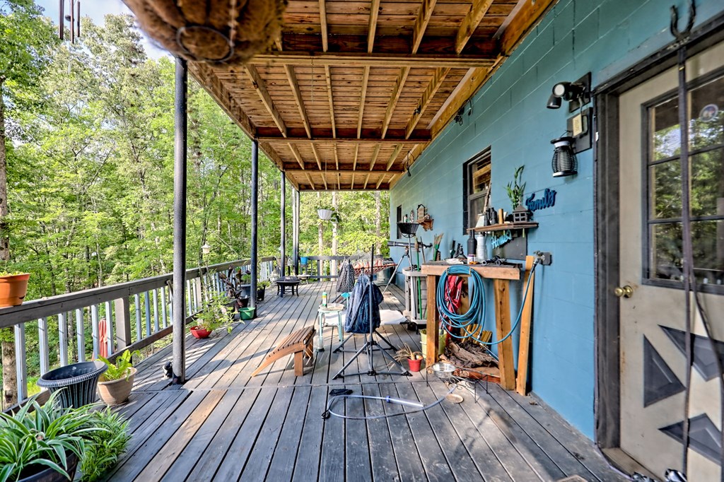 773 Rolling Oaks Road Murphy, NC 28906 - Photo 52 of 72 a view of outdoor space with wooden floor and outdoor seating