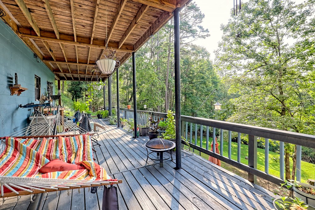 773 Rolling Oaks Road Murphy, NC 28906 - Photo 53 of 72 a view of porch with a table and chairs