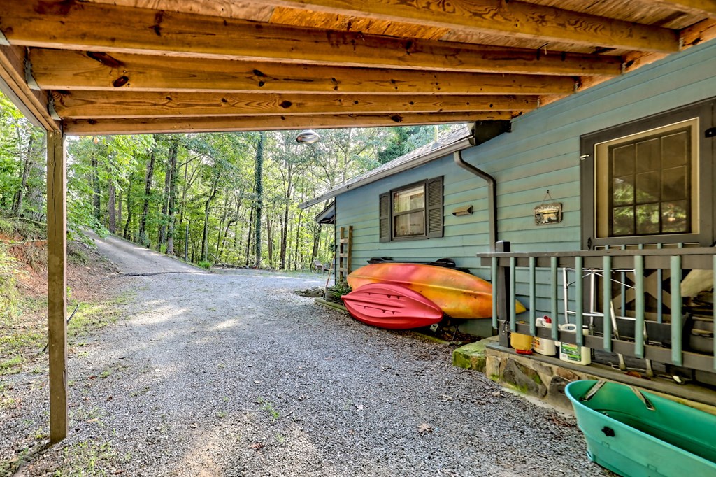 773 Rolling Oaks Road Murphy, NC 28906 - Photo 59 of 72 a view of a swimming pool with a yard in front of it
