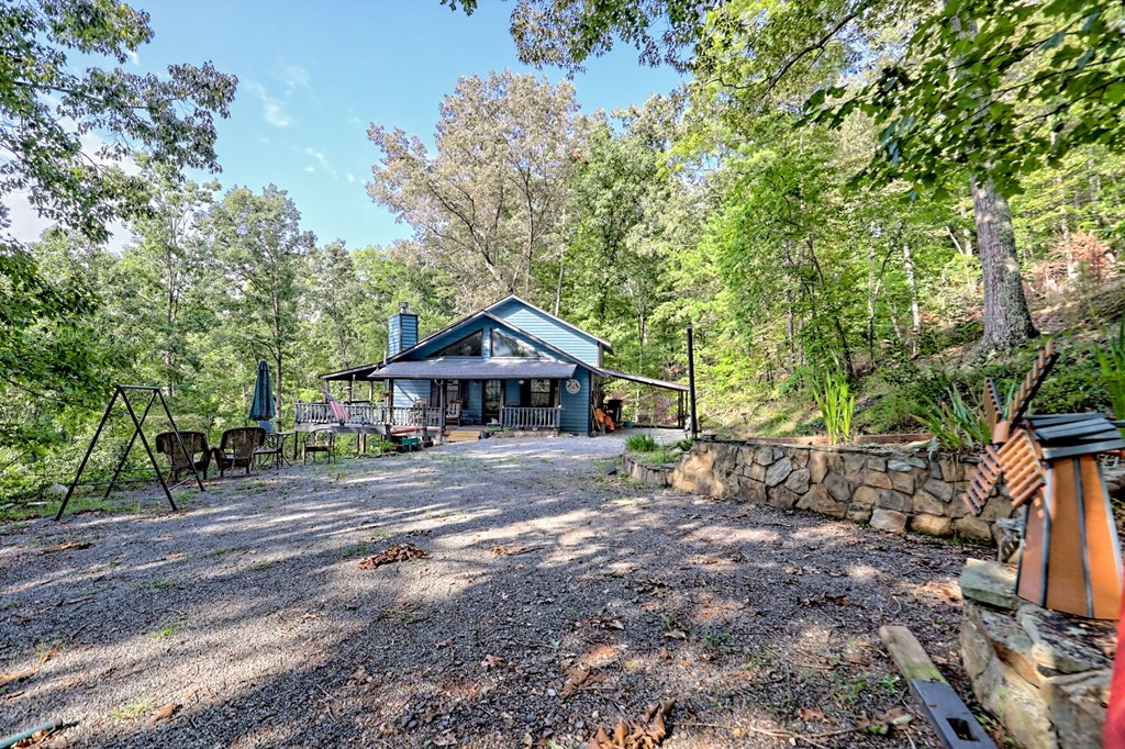 773 Rolling Oaks Road Murphy, NC 28906 - Photo 61 of 72 a front view of a house with a yard