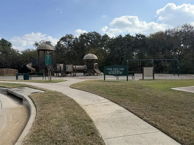 a picture of a bench in the window