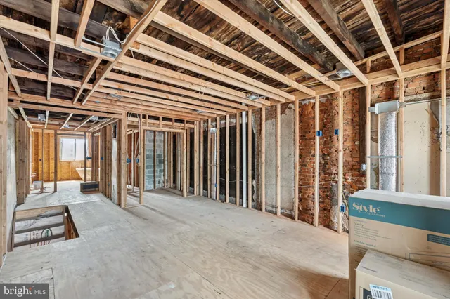 a view of a room with wooden walls