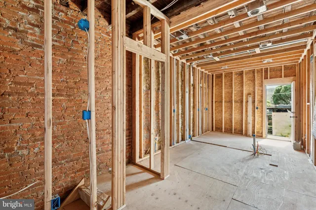 a view of a room with wooden walls