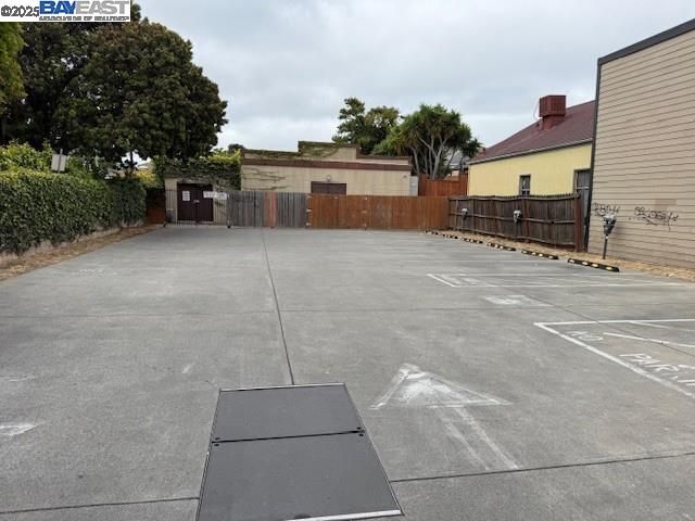 a view of a yard with car parked