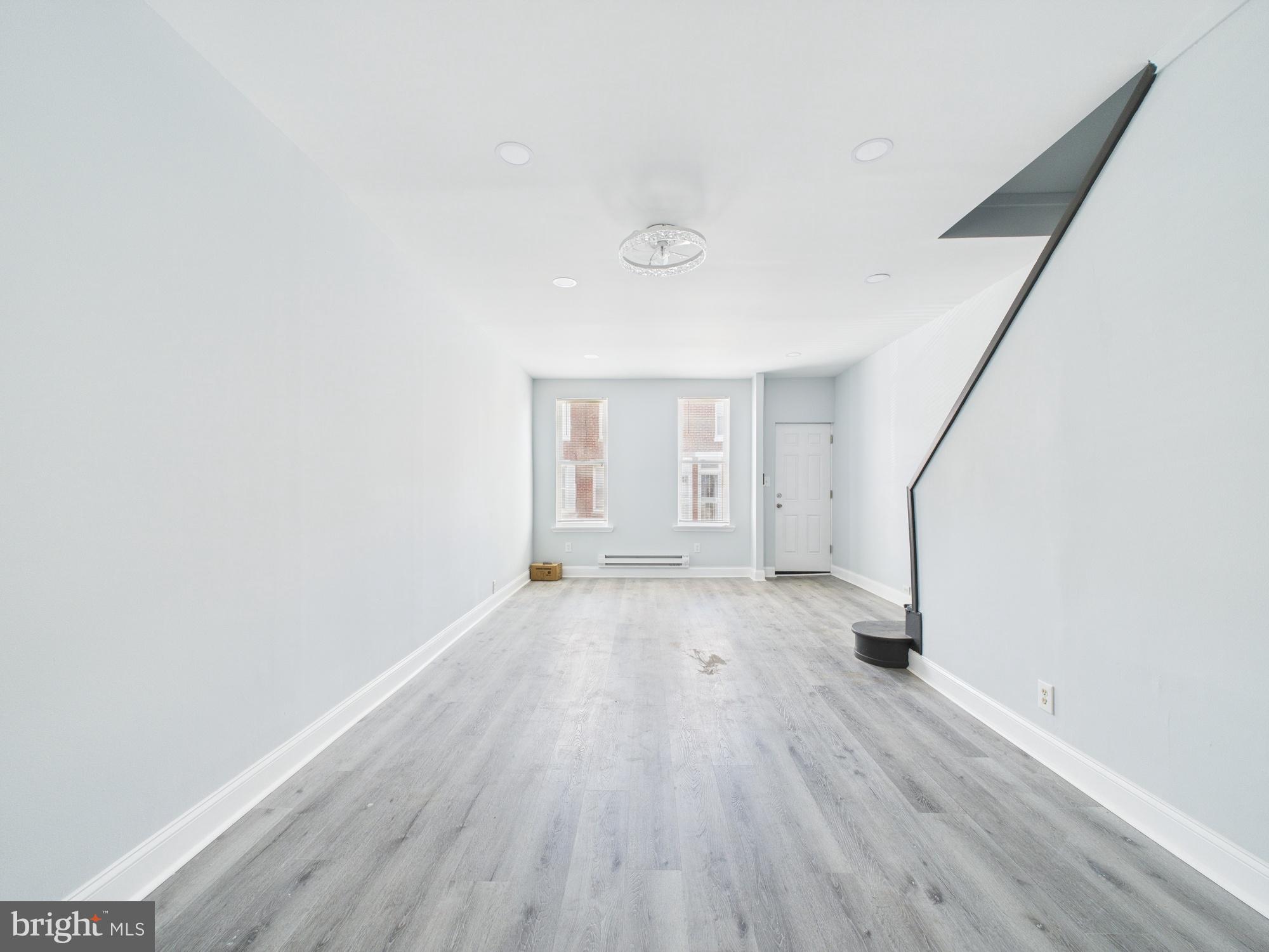 2021 Granite Street Philadelphia, PA 19124 - Photo 9 of 9 a view of empty room with wooden floor and fan