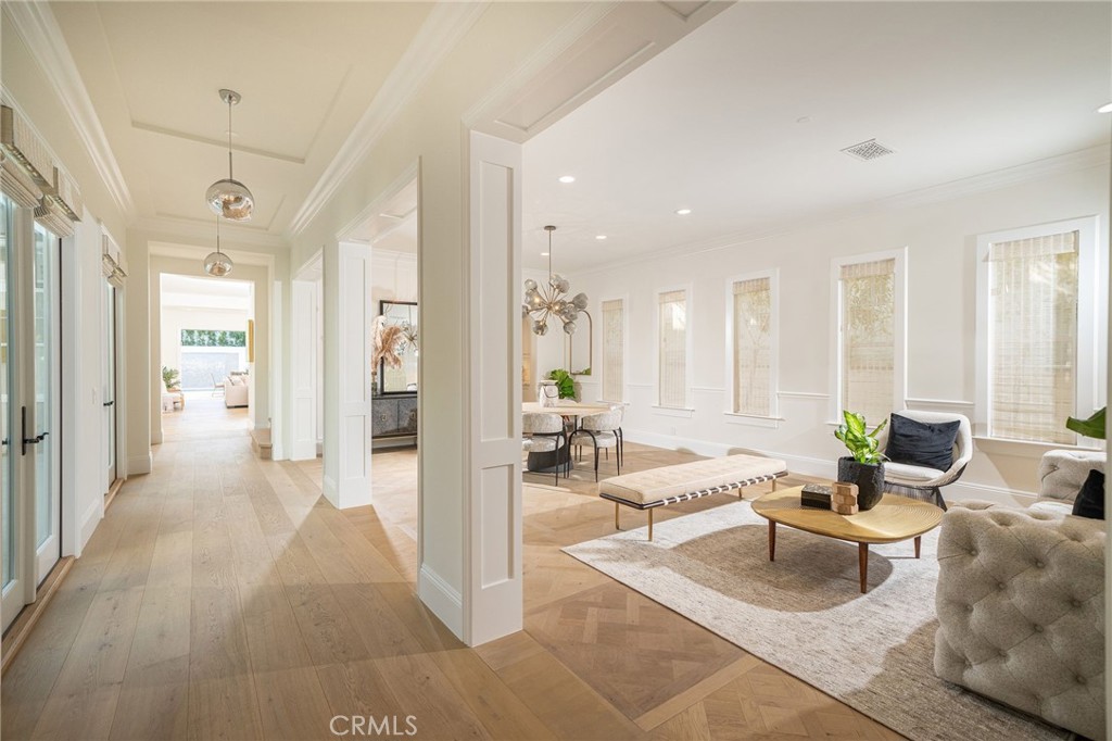 17 Boardwalk Newport Beach, CA 92660 - Photo 12 of 58 a living room with furniture and a large window