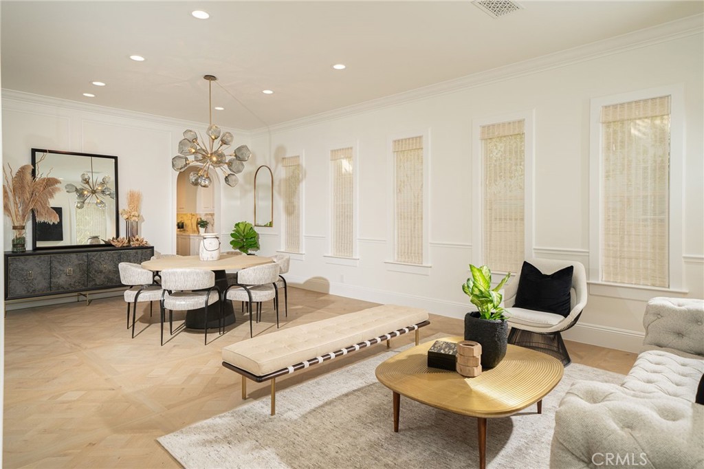 17 Boardwalk Newport Beach, CA 92660 - Photo 13 of 58 a living room with furniture and a potted plant