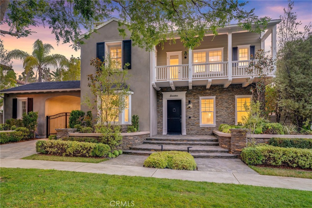 17 Boardwalk Newport Beach, CA 92660 - Photo 2 of 58 a front view of a house with a yard