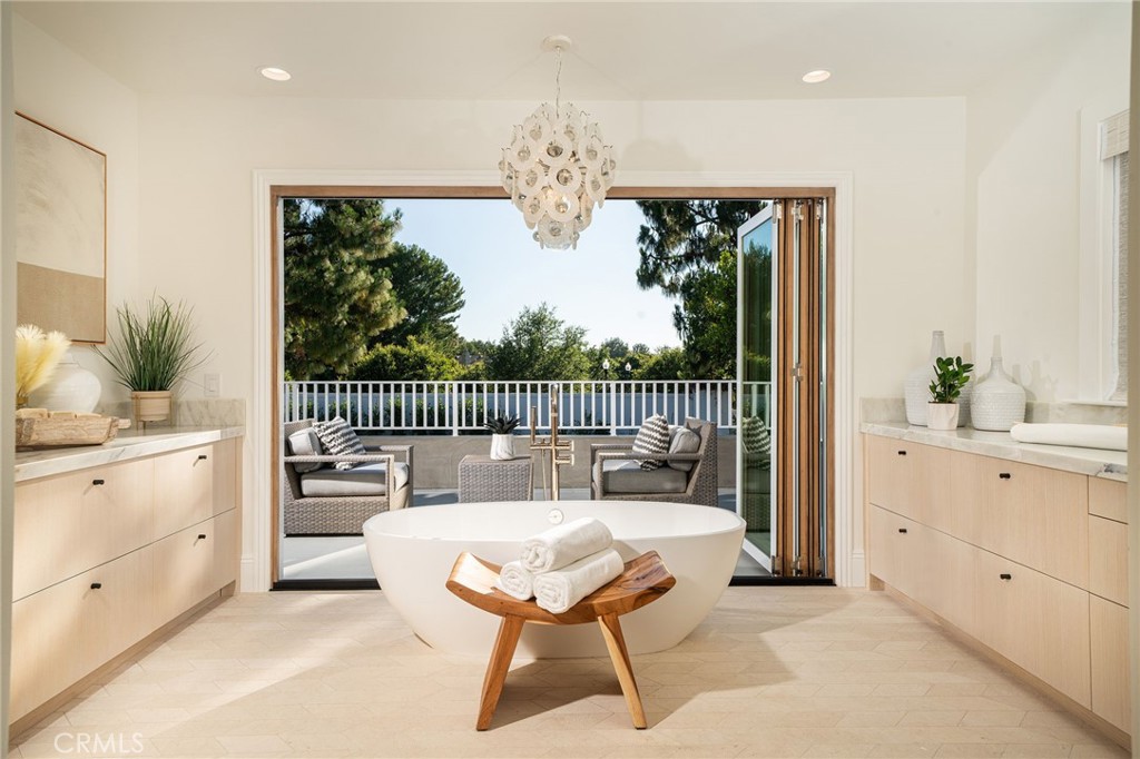 17 Boardwalk Newport Beach, CA 92660 - Photo 21 of 58 a living room with furniture a chandelier and a rug