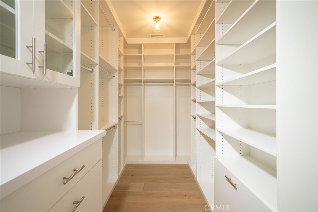 17 Boardwalk Newport Beach, CA 92660 - Photo 23 of 58 a view of walk in closet with empty racks