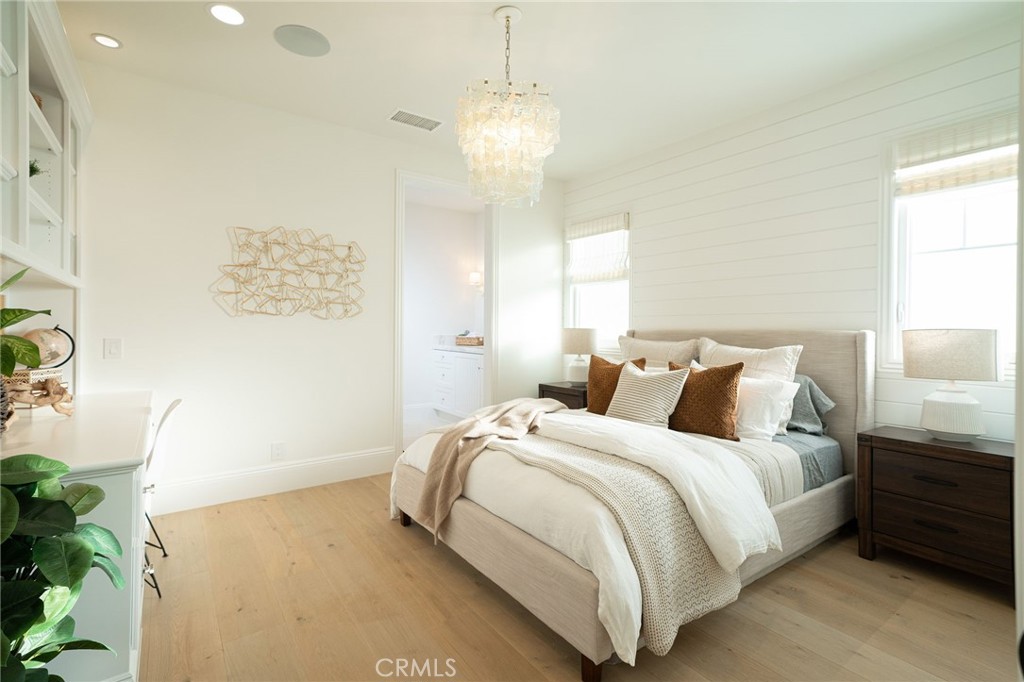 17 Boardwalk Newport Beach, CA 92660 - Photo 25 of 58 a bedroom with bed and a window
