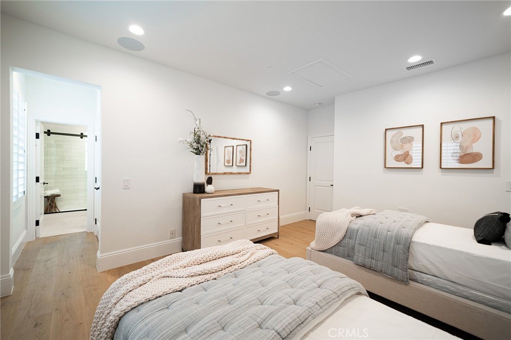 17 Boardwalk Newport Beach, CA 92660 - Photo 28 of 58 a bedroom with a bed and a view of bathroom