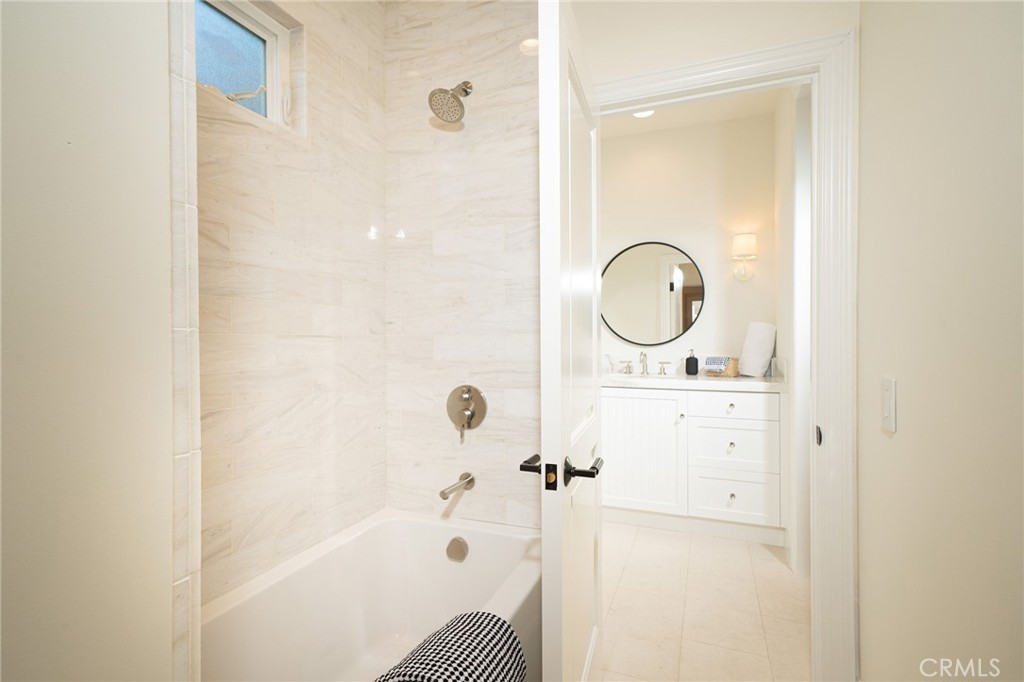 17 Boardwalk Newport Beach, CA 92660 - Photo 30 of 58 a bathroom with a bath tub and a shower