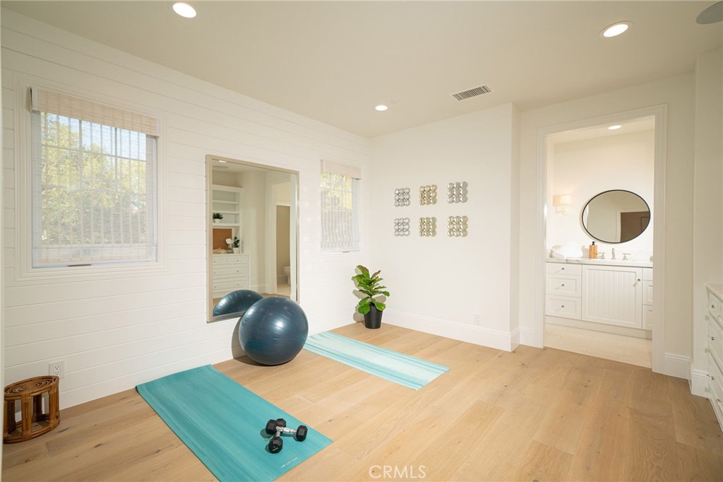 17 Boardwalk Newport Beach, CA 92660 - Photo 34 of 58 a bedroom with a bed and window