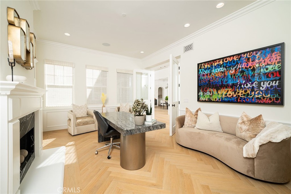17 Boardwalk Newport Beach, CA 92660 - Photo 40 of 58 a living room with fireplace furniture and a flat screen tv