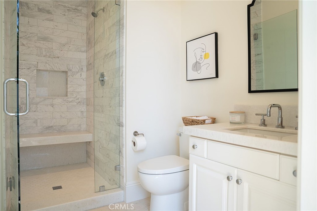 17 Boardwalk Newport Beach, CA 92660 - Photo 44 of 58 a bathroom with a granite countertop sink toilet and shower