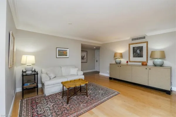 a living room with furniture and a couch