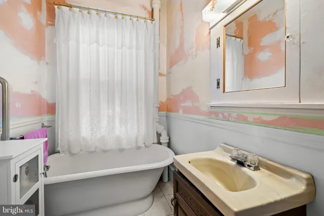 a bathroom with a sink and a bathtub