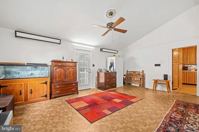 a bed room with a bed and dresser