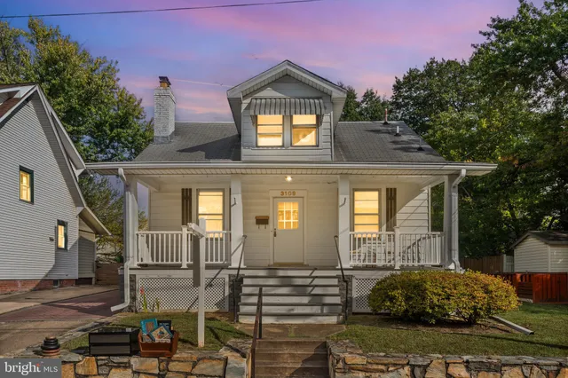 a front view of a house with parking