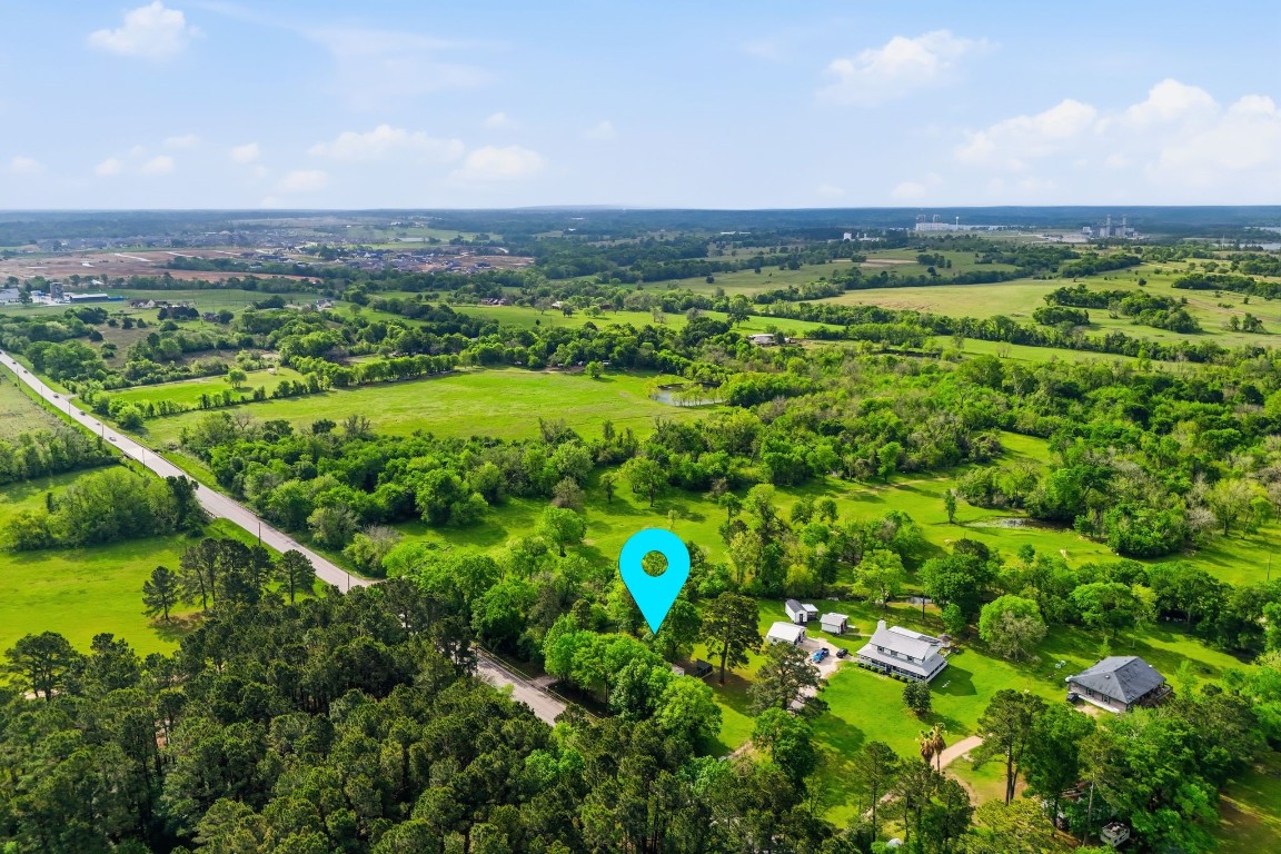 11757 Calvary Road Willis, TX 77318 - Photo 30 of 33 Enjoy a quiet setting surrounded by greenery, with nearby homes spaced out for a more peaceful feel.