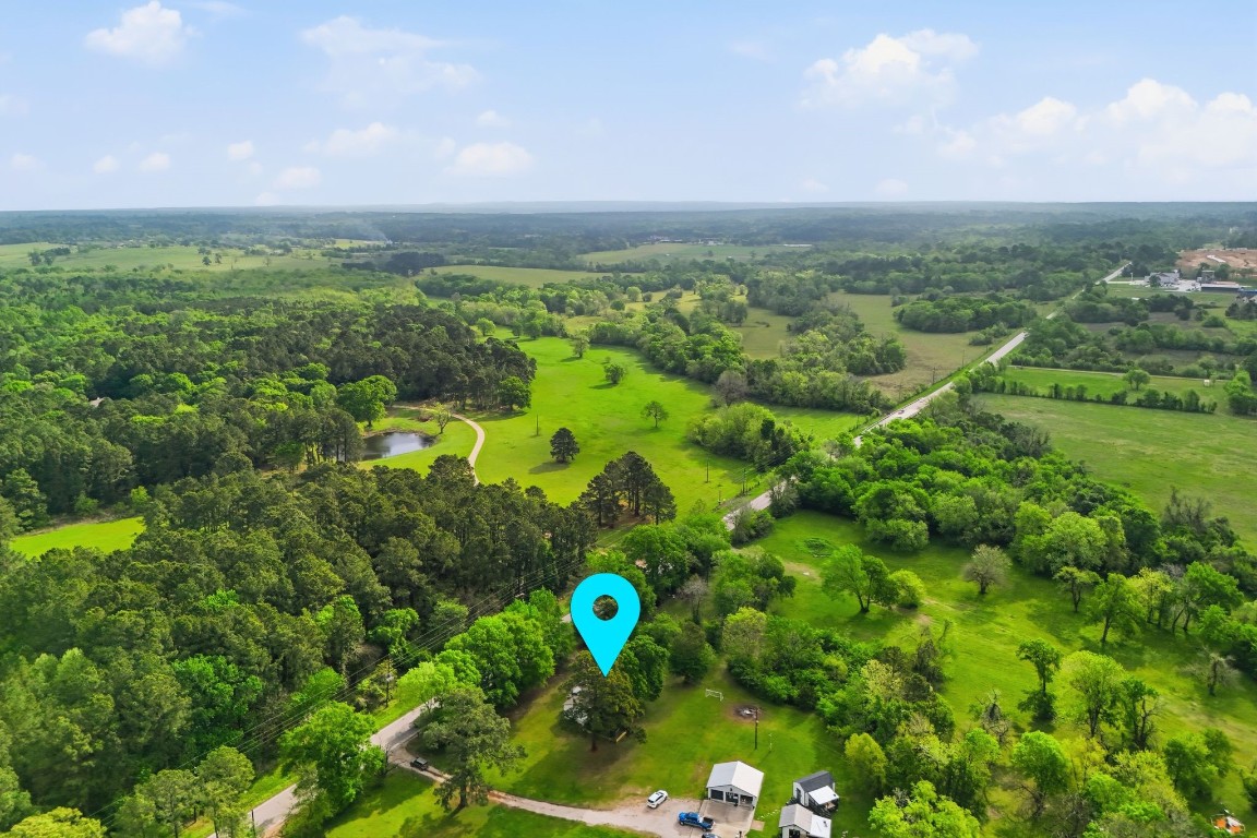 11757 Calvary Road Willis, TX 77318 - Photo 31 of 33 Peaceful setting surrounded by trees and open space.
