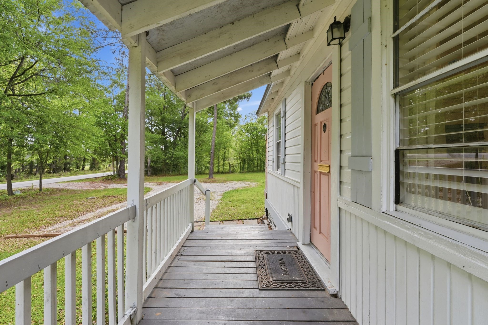 11757 Calvary Road Willis, TX 77318 - Photo 5 of 33 A cozy entryway with a covered porch