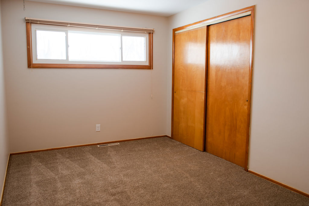 425 West Donald Street Kankakee, IL 60901 - Photo 12 of 14 an empty room with windows and closet