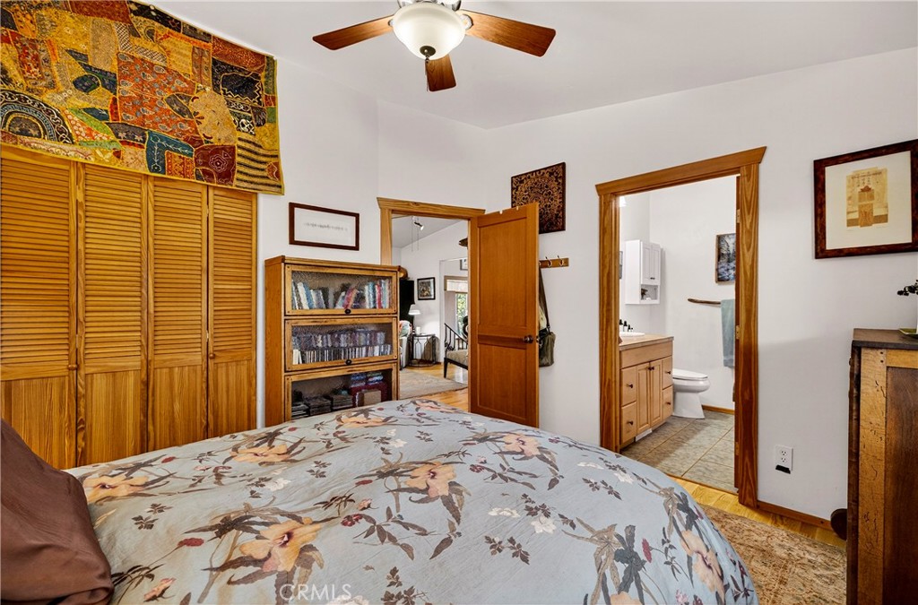 15001 Culiacan Court Forest Ranch, CA 95942 - Photo 18 of 66 a bed room with a bed and a television