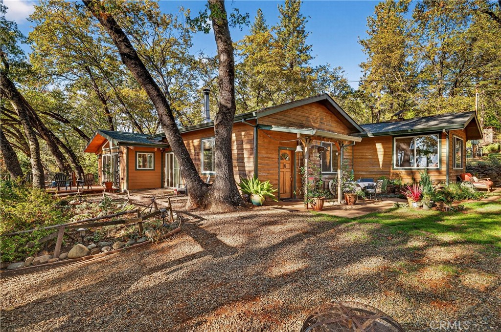 15001 Culiacan Court Forest Ranch, CA 95942 - Photo 2 of 66 a front view of a house with a yard