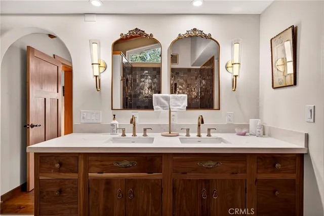 a view of a balcony with wooden floor and bench