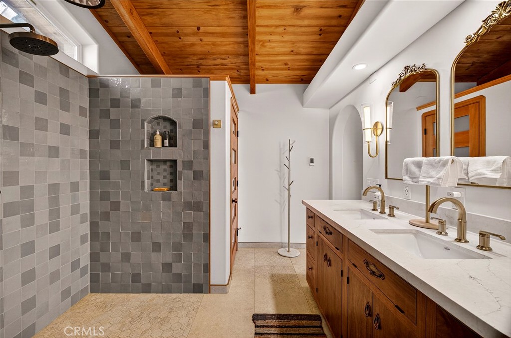 15001 Culiacan Court Forest Ranch, CA 95942 - Photo 26 of 66 a spacious bathroom with a sink a mirror and shower