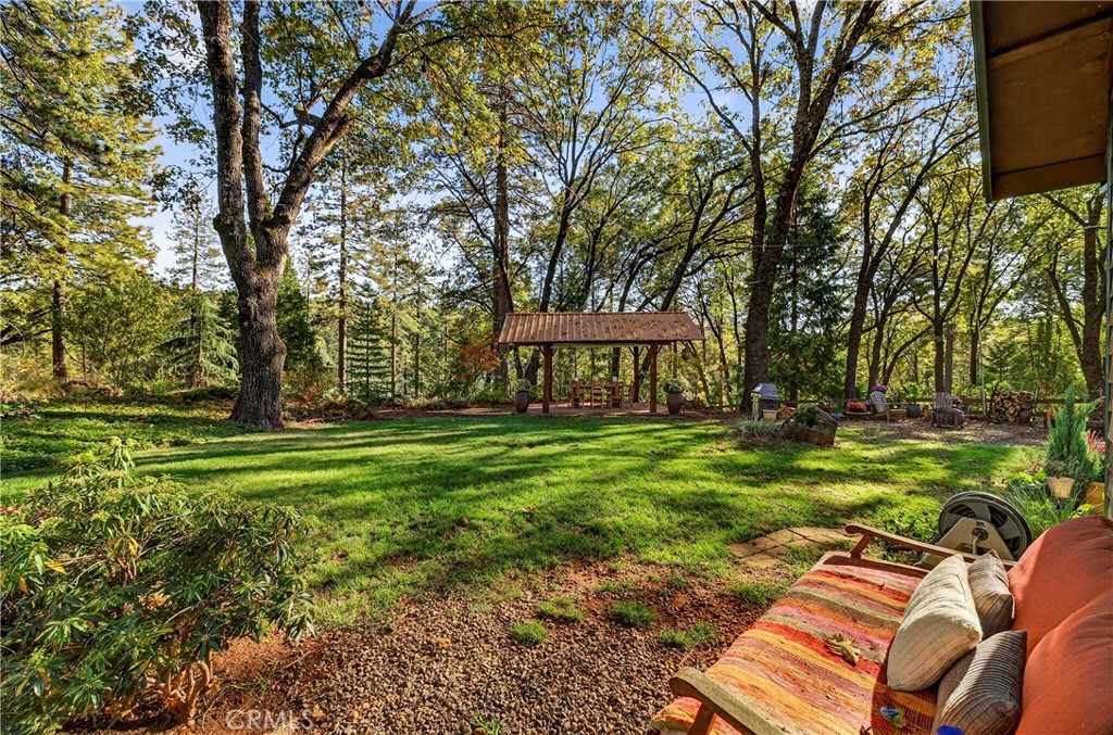 15001 Culiacan Court Forest Ranch, CA 95942 - Photo 32 of 66 a view of a house with a yard