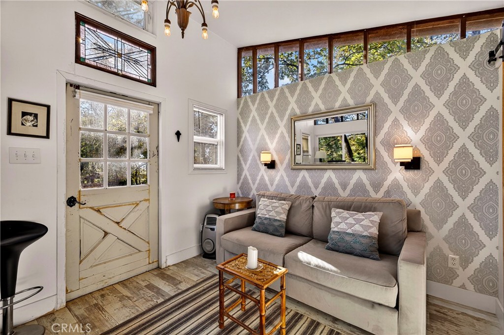 15001 Culiacan Court Forest Ranch, CA 95942 - Photo 39 of 66 a living room with furniture and a painting on the wall