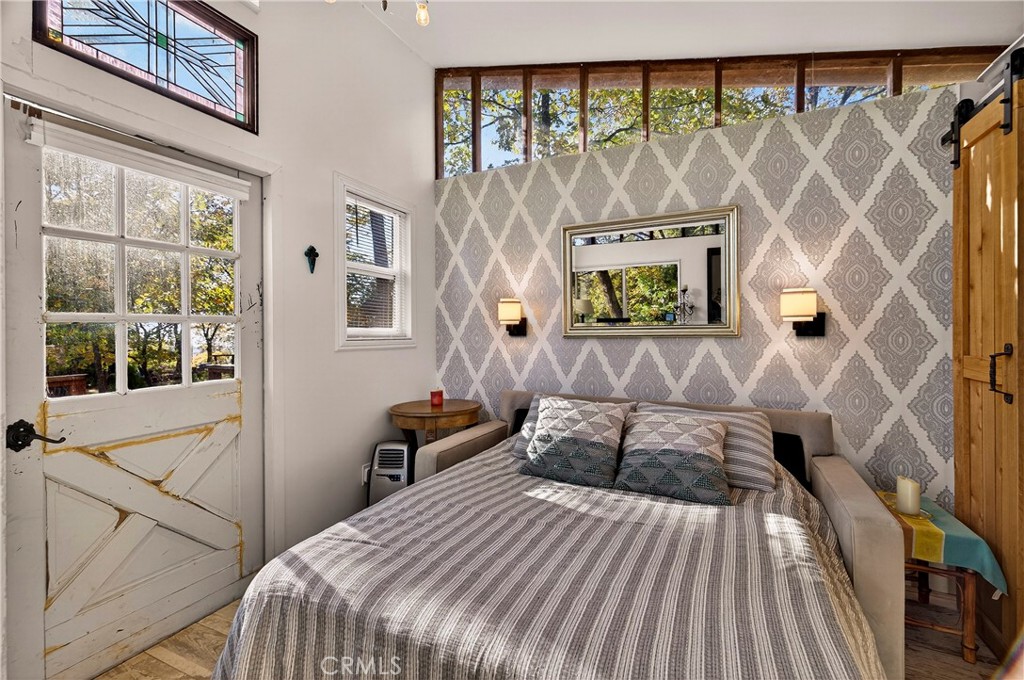 15001 Culiacan Court Forest Ranch, CA 95942 - Photo 40 of 66 a bed sitting in a bedroom next to a window