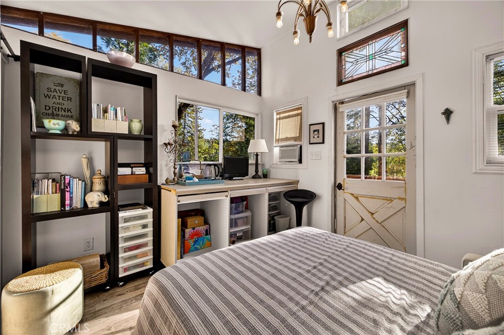 15001 Culiacan Court Forest Ranch, CA 95942 - Photo 41 of 66 a bedroom with a bed and a large window