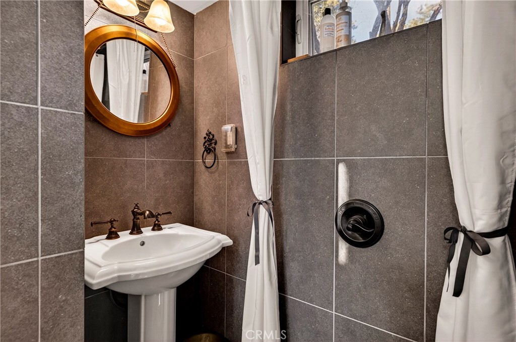 15001 Culiacan Court Forest Ranch, CA 95942 - Photo 42 of 66 a bathroom with a sink and mirror