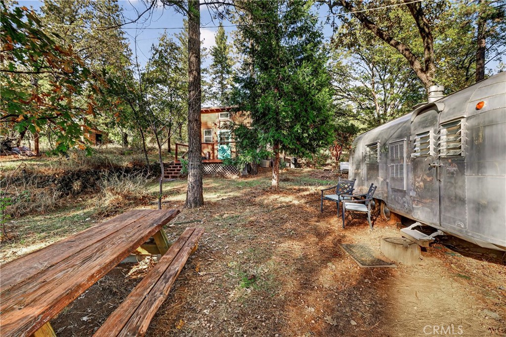 15001 Culiacan Court Forest Ranch, CA 95942 - Photo 43 of 66 a view of a yard with wooden fence