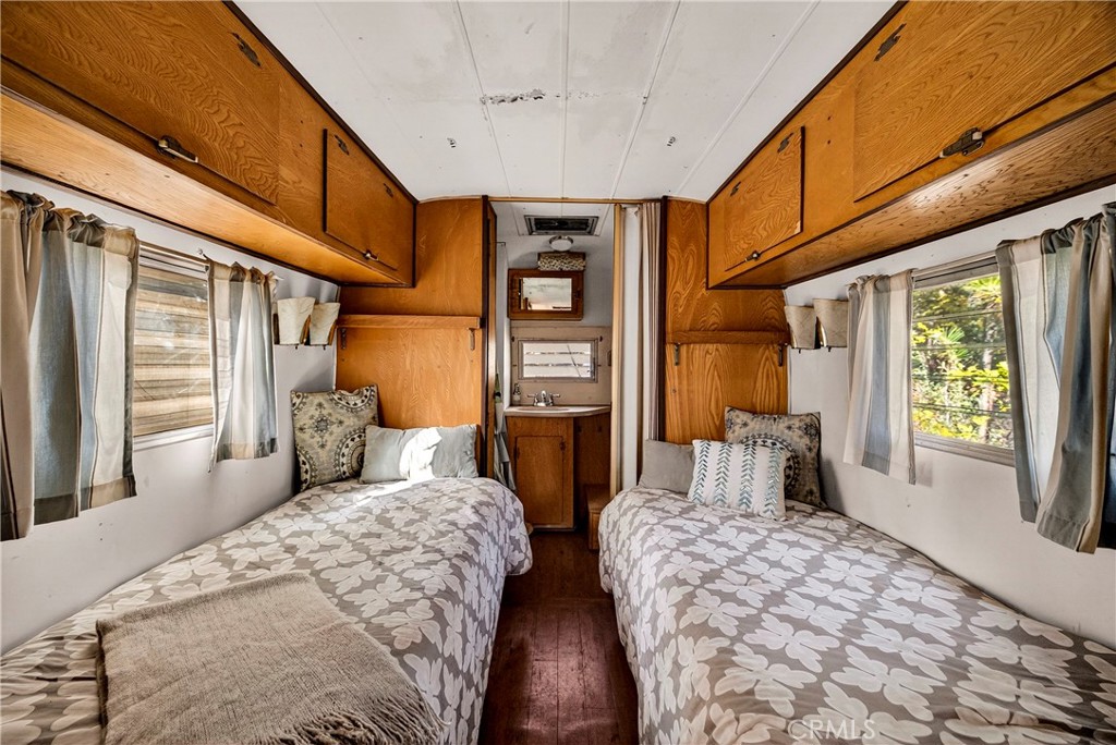15001 Culiacan Court Forest Ranch, CA 95942 - Photo 45 of 66 a bedroom with two beds and a large window