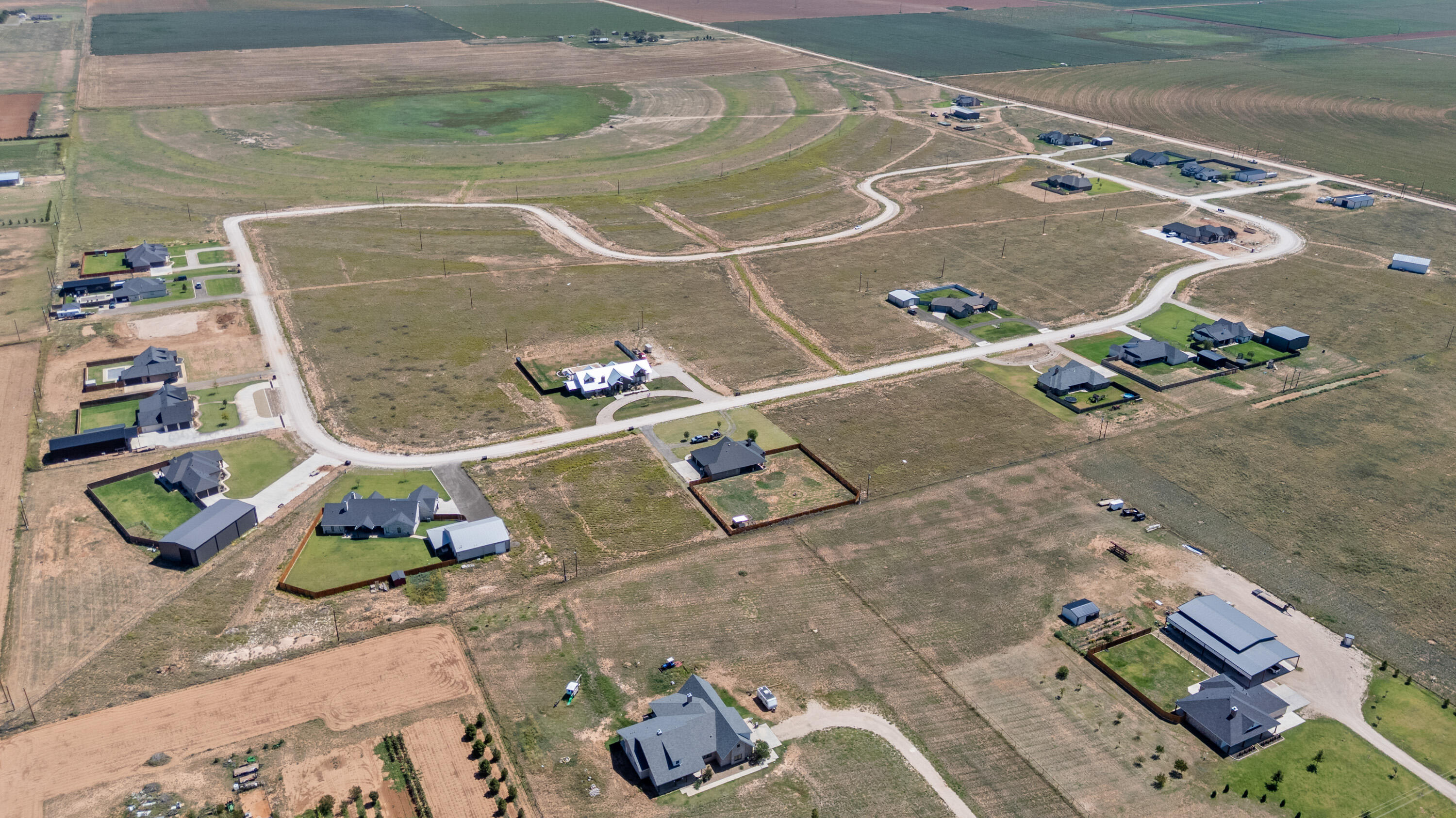 3983 Evan Street Ropesville, TX 79358 - Photo 12 of 16 an aerial view of a wooden house with a yard