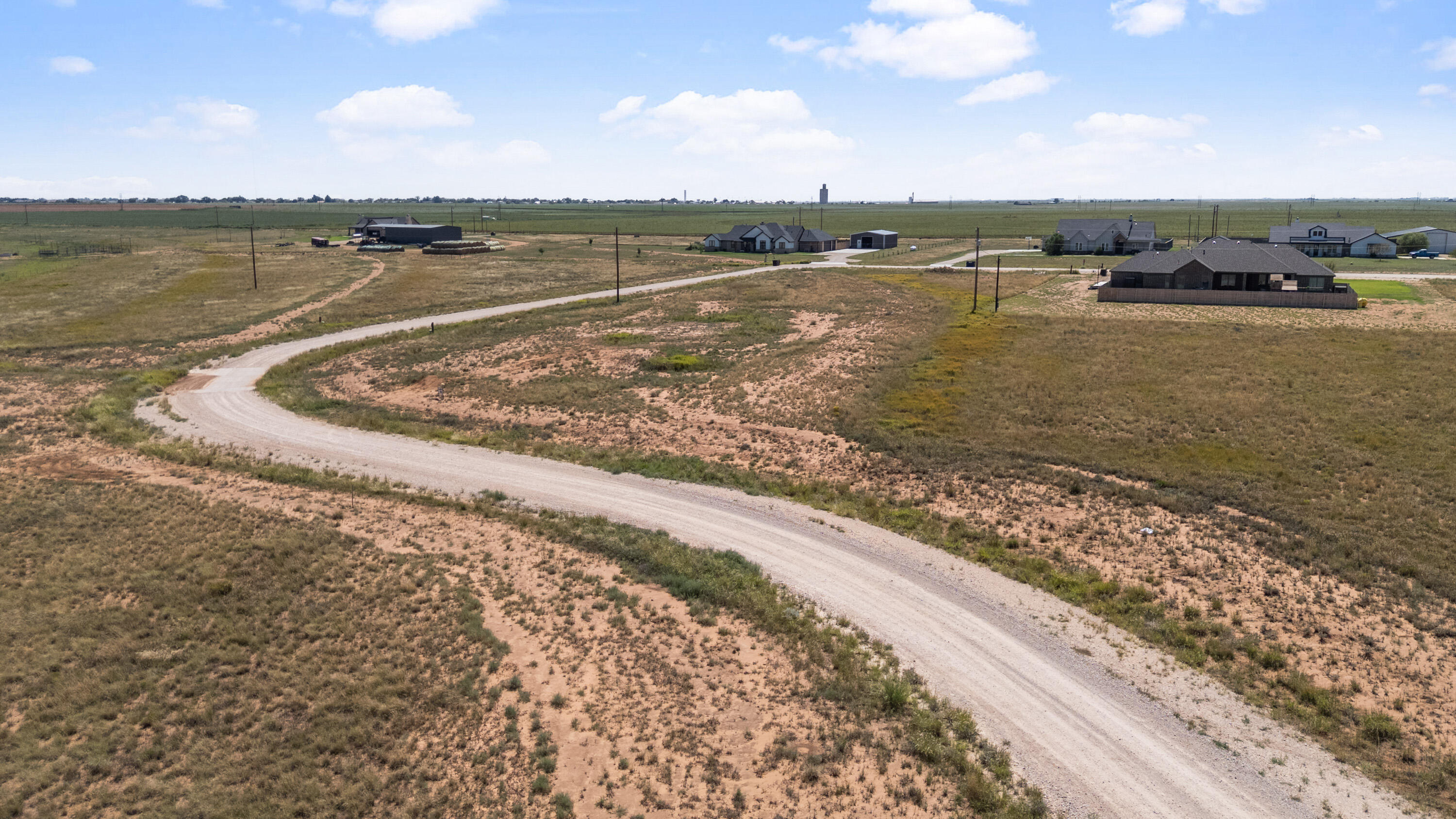 3983 Evan Street Ropesville, TX 79358 - Photo 16 of 16 a view of a lake with a beach